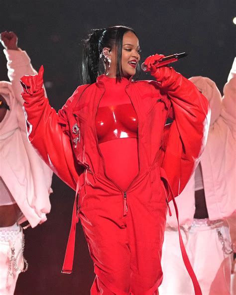 Pregnant Rihanna rocks plunging dress at 35th birthday party