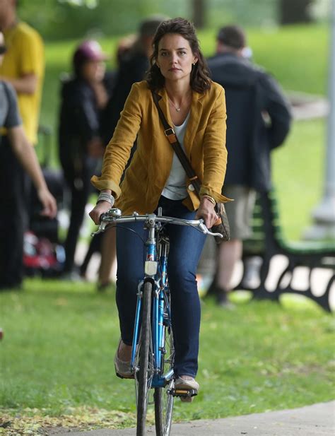 KATIE HOLMES Riding a Bike on the Set of The Gift in Montreal 06/22