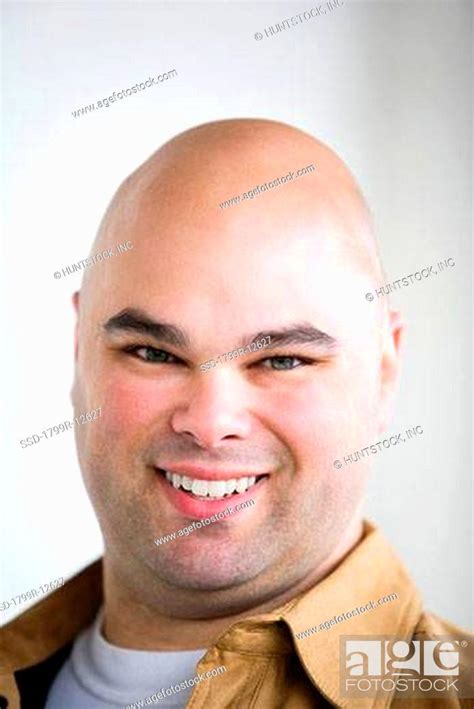 portrait   bald headed man smiling stock photo picture  royalty