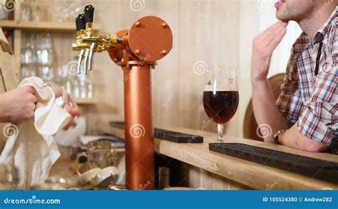 Young Man Drinks Beer Behind a Bar Counter Stock Footage - Video of ...