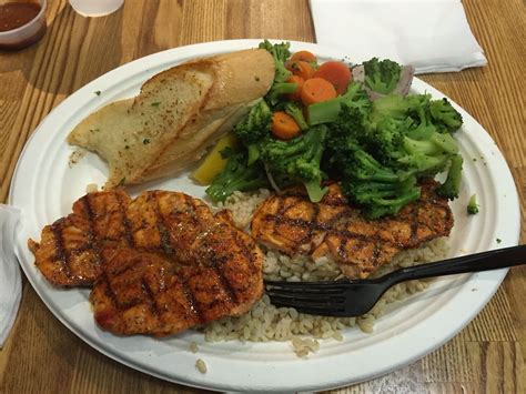 Delicious Grilled Salmon with Brown Rice and Steamed Vegetables