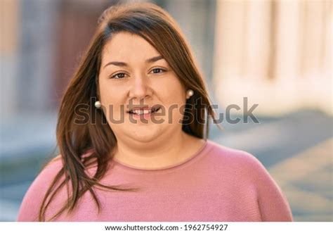 Young Hispanic Plus Size Woman Smiling Stock Photo 1962754927 ...