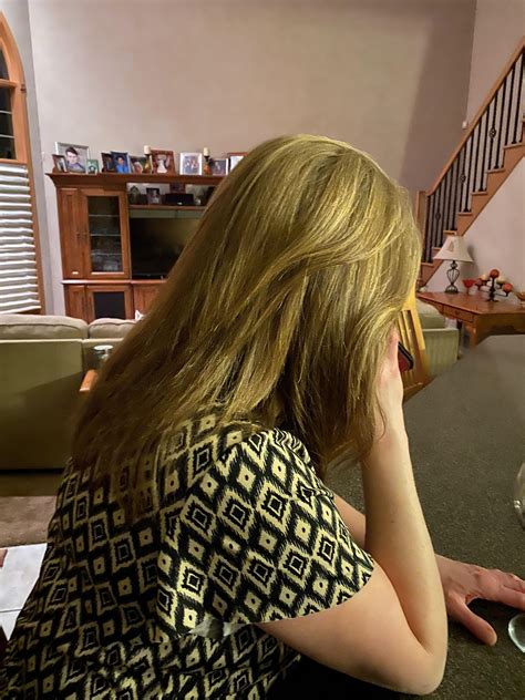 My wife being shy. Showing her beautiful red hair with blond highlights