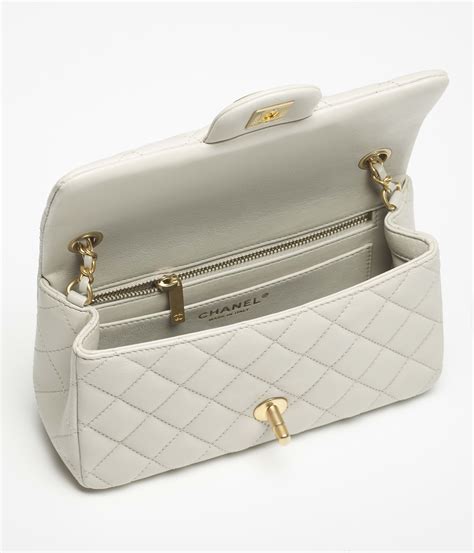 Mini flap bag, Shiny lambskin & gold-tone metal, light gray — Fashion