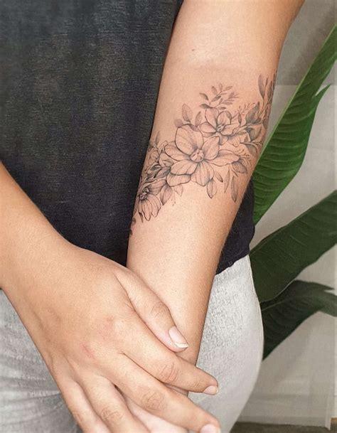 12 Unique Flower Arm Tattoos For Females