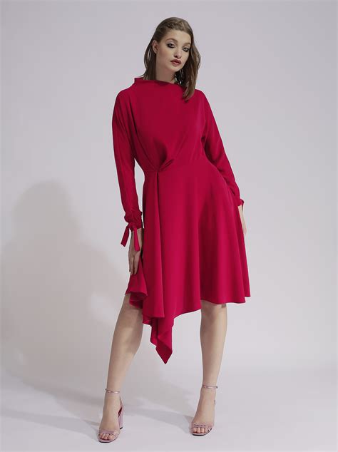 Raspberry red dress with asymmetric cut on the hem