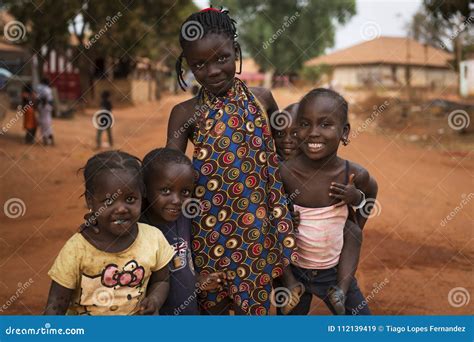 Portrait of a Smiling Group of Children in the Town of Nhacra in Guinea Bissau Editorial Stock ...