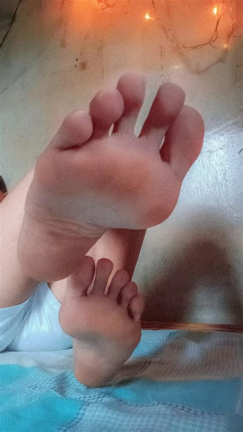 Would you like to lick these soft pink soles? I know you can't resist