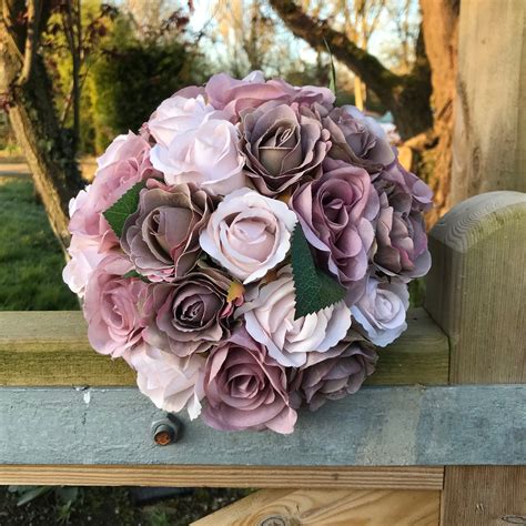 A wedding bouquet collection of dusky pink and nude roses – AbigailRose