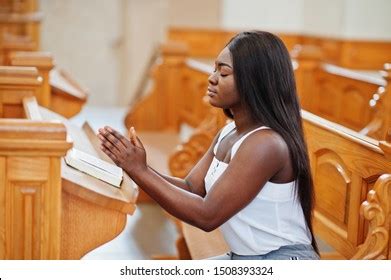 Black Woman Praying In Church