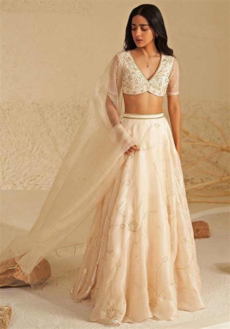 ivory  gold metallic organza lehenga set  lehenga designs