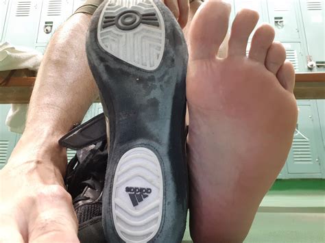 Soles of my feet and my wrestling shoes | Scrolller