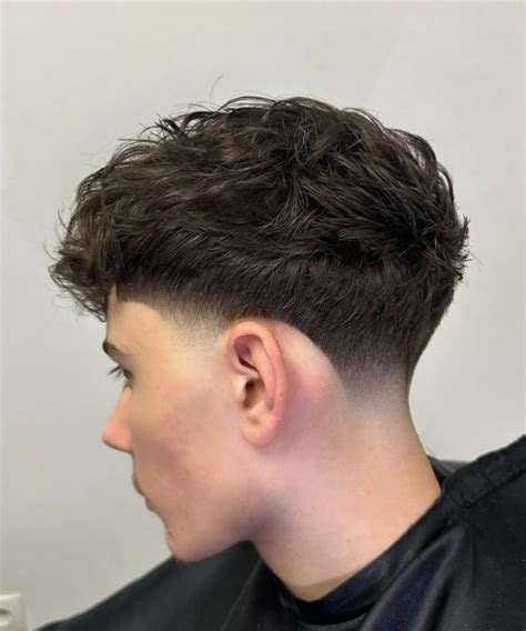 Low Taper Fade Haircut Textured Top