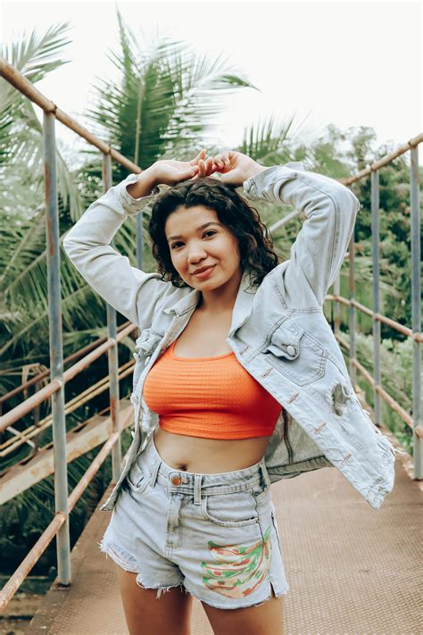 Brunette in Bikini Undressing · Free Stock Photo