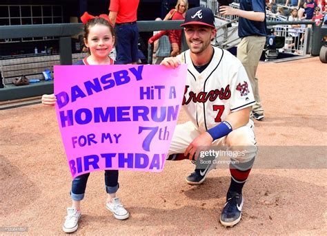 dansby swanson   atlanta braves poses   young fan