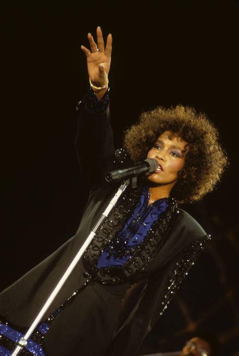 Download Whitney Houston In Afro Wallpaper | Wallpapers.com