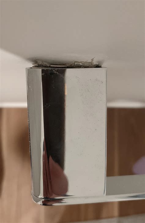 I accidentally put weight on the toilet paper handle and tore the screw