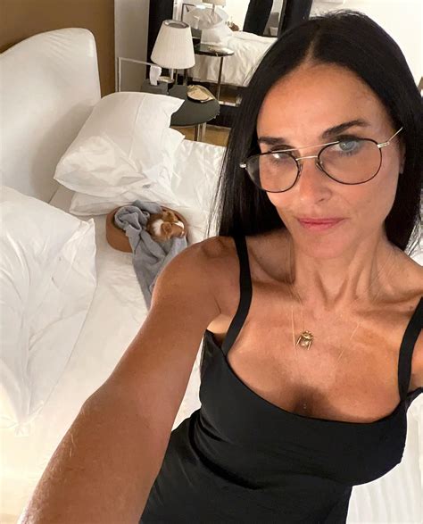 Demi Moore, 60, puts her ageless figure on display in racy selfies from