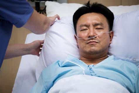 premium photo  sick asian man   hospital