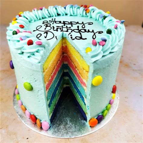 Sky Blue Rainbow Cake - Quigleys