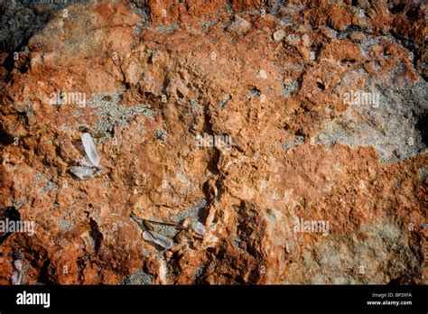 Rust coloured rock texture Stock Photo - Alamy