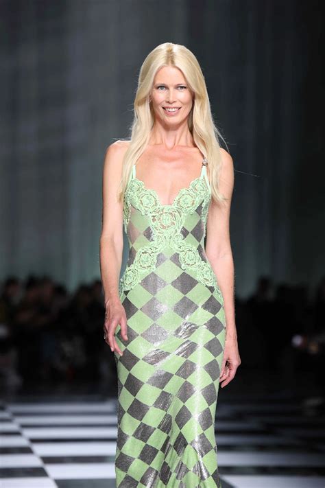 Claudia Schiffer Celebrates Her 55th Birthday in a Plunging White