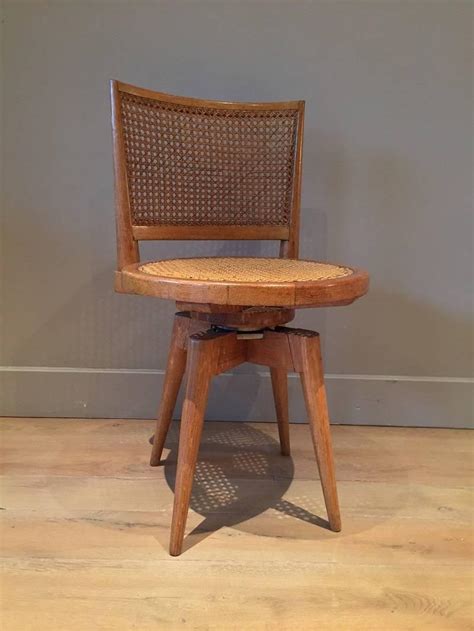 Modernist Swivel Chair Oak Ratan at 1stDibs | ratan chair