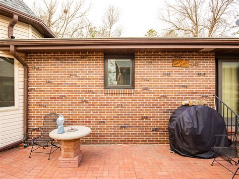 Brown Lifestyle Series Window and Door Update on Brick Ranch - Pella