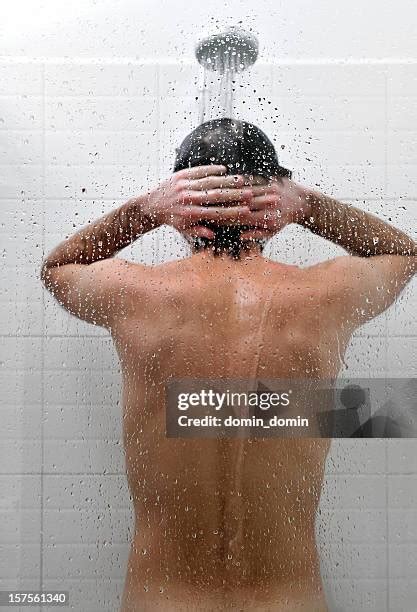 man  shower stock  high res pictures  images
