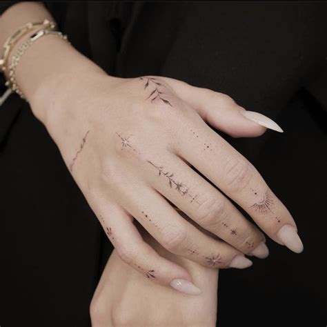 Dainty fine line hand tattoo | Hand tattoos for girls, Hand and finger ...