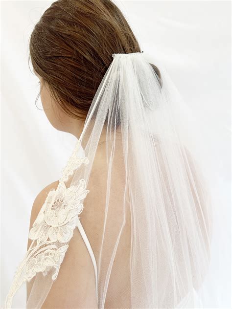 Zinnia - Single layer Ballet length moderate veil corded with alencon