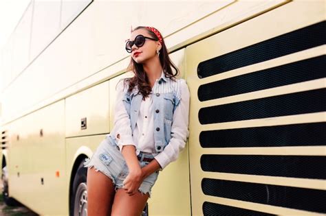 photo sensual young woman posing    bus