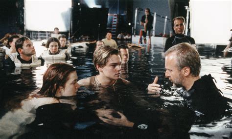 James Cameron directing Leonardo Dicaprio and Kate Winslet in the water