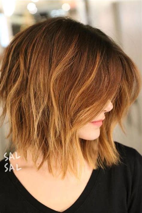 angled lob haircuts  prove blunt isn    artofit