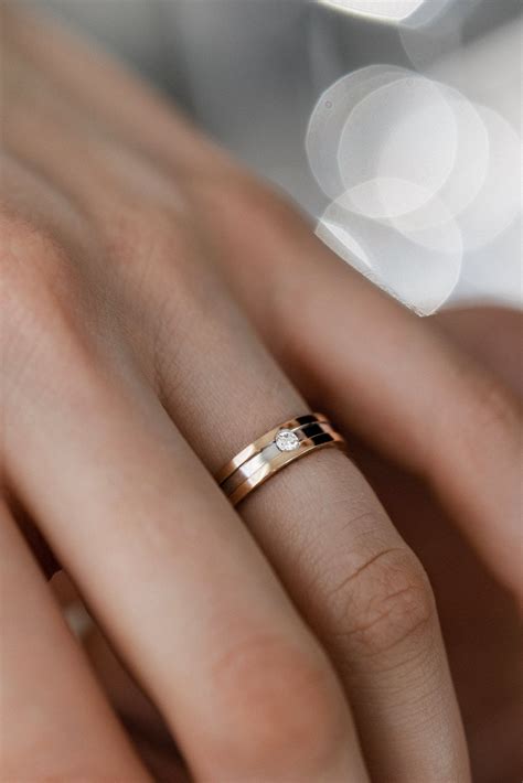 Two-tone wedding rings set with diamond in her ring - couple rings