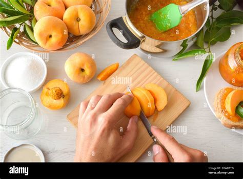 person cutting peach pieces  res stock photography  images alamy
