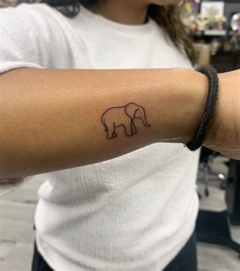 wrist elephant tattoos small  meaningful ideas   wrist