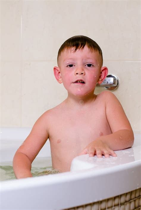Boy Holding Shower Over His Head Stock Photo - Image of childhood ...