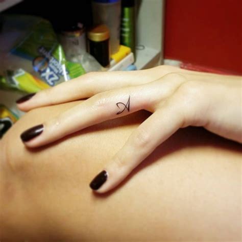 Tattoo Filter | Small finger tattoos, Finger letter tattoos, Finger ...