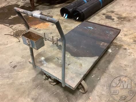 4 WHEEL HEAVY DUTY METAL CART, STEEL WHEELS - Jeff Martin Auctioneers, Inc.