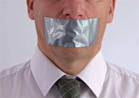 Businessman with duct tape over mouth — The James G. Martin Center for ...