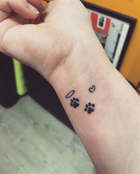 Dog Paw Print Tattoo On Wrist