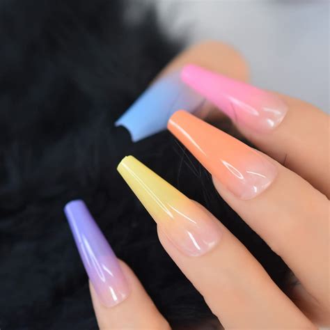 Salon goers debate if coffin acrylic nails are too long for work 3