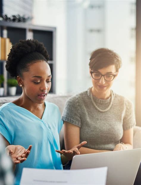 Lets Look at it from a Different Angle. Businesswomen Having a ...