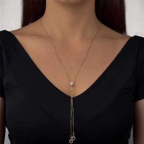 Joia Produtos Naturais - Colar Semi Jóia Dourado Estilo Gravatinha - Relojoaria e Ótica Suiça