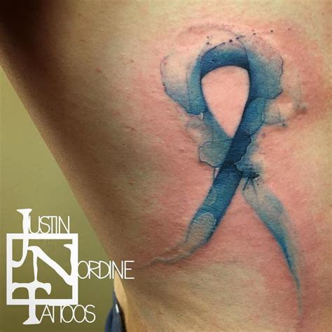 Blue Cancer Ribbon Tattoo