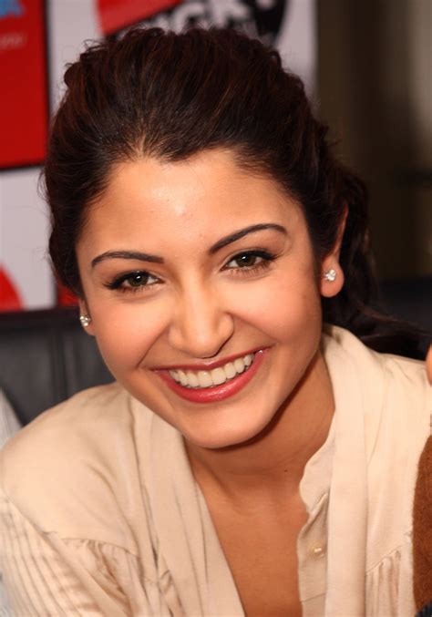 Download Anushka Sharma Smiling Wallpaper | Wallpapers.com