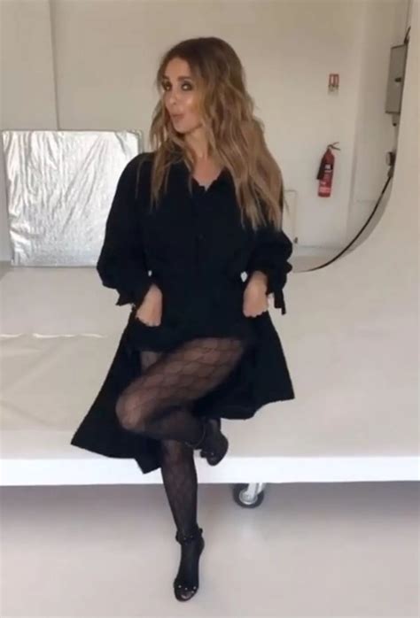 Louise Redknapp shows off killer legs as she flashes knickers for racy