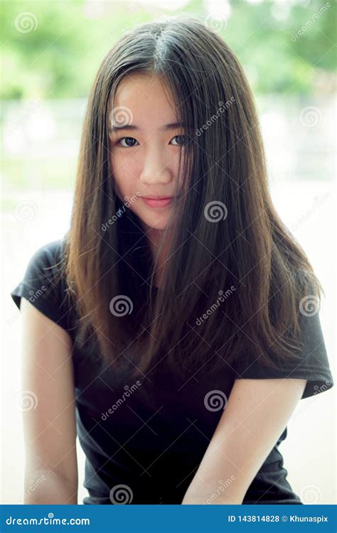 Portrait Headshot of Beautiful Asian Teenager Looking with Eyes Contact ...