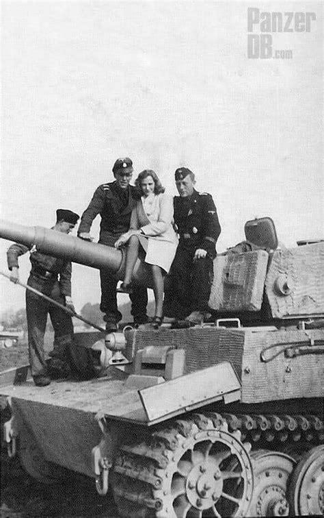 A Tiger tank crew posing with a woman by Gtfir on DeviantArt